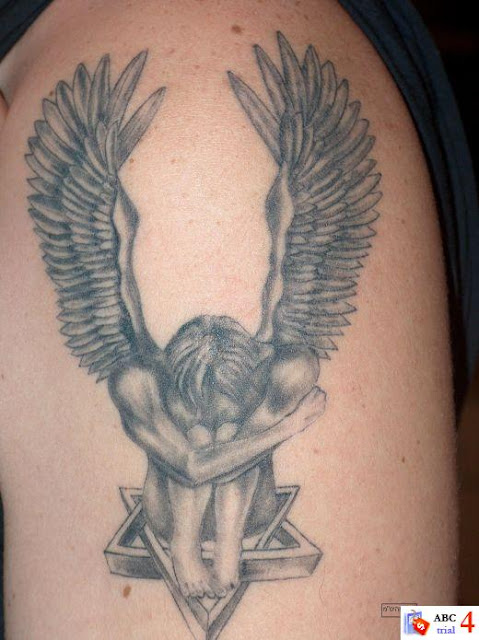 Tribal cross & angel wings. August 19, 2008 by masami @ gemini tattoo