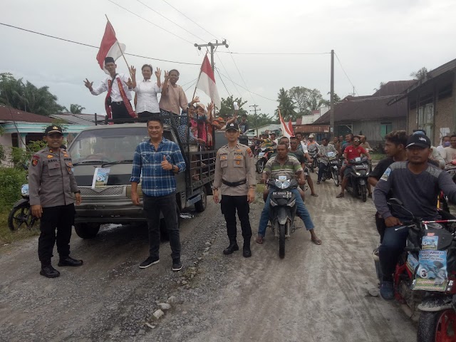 Kasatres Narkoba Polres Batu Bara Bersama Plt Kapolsek Indrapura Melaksanakan Pengamanan Kampanye Pilkades 