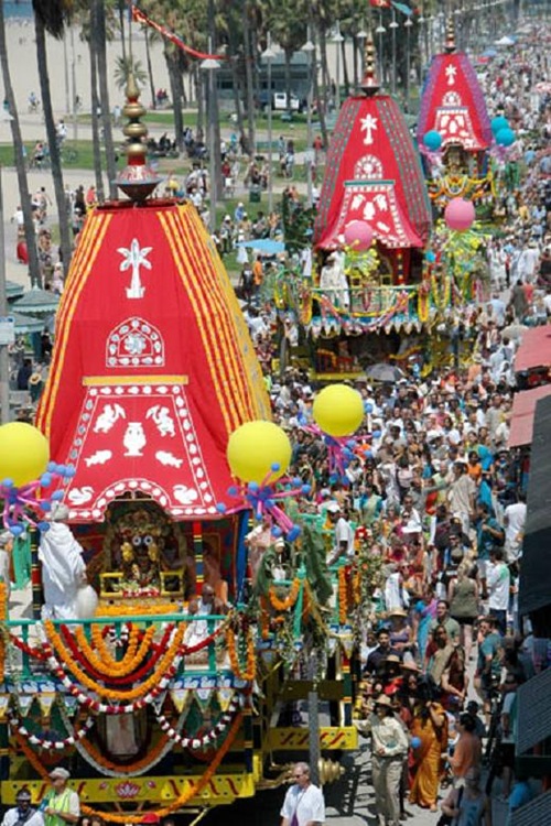 Hare Krishna's pull three fully decorated, four-story chariots south along Ocean Front Walk on Sunday, Aug 05, 2007 during the the 31th Annual  Festival of Chariots. There was a free vegetarian feast for thousands, dancing, exhibits and entertainment.  The festival celebrates Lord Jagannatha, the Lord of the Universe, and is put on by the International Society for Krishna Consciousness (ISKCON). The Festival of the Chariots is now performed in every country across the world and dates back 5 thousand of years to Jagannatha Puri, India. 
