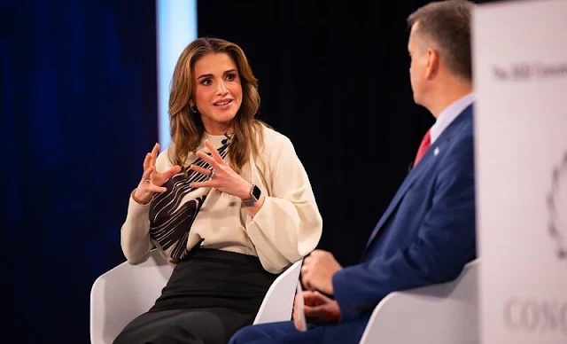 Queen Rania wore a new graphic print blouse by Fendi, and black suede pumps by Jennifer Chamandi