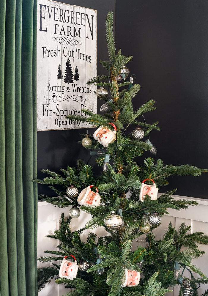 Santa mugs on Christmas tree