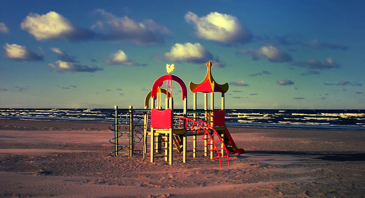 empty children playground by sea