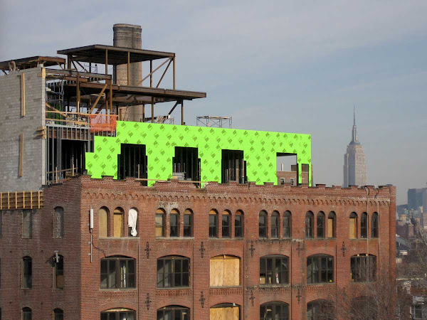 Hot Green Tyvek - During construction, from the Brooklyn end of the Williamsburg Bridge.