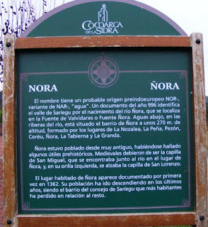 Cartel del barrio de Nora