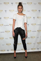 victoria secret angel taylor hill flaunted her slender legs in black leather skinny pants attended behati x juicy launch