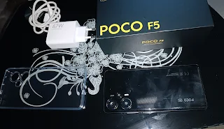 Poco F5 unboxed contents - Poco F5 box, Poco F5 charger, Poco F5 silicon case, Poco F5 usb-c cable