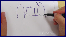 photo of: Drawing a Bike with a kindergarten Student