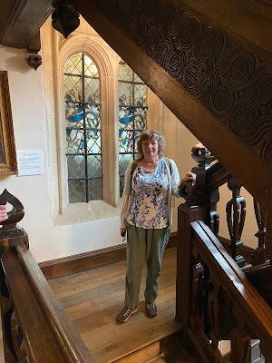 Rachel Knowles by staircase in Athelhampton House (2023)