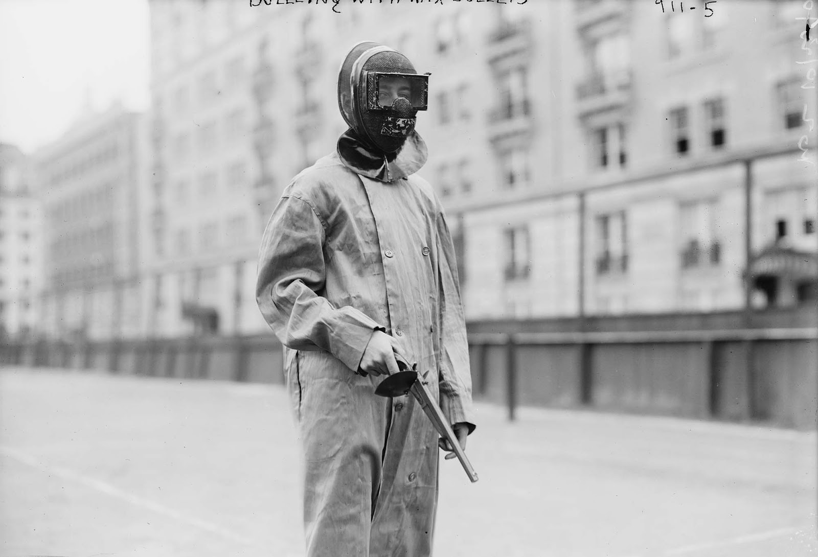 Note the handguard on the pistol's grip to shroud the shooter's exposed hand. The wax bullets used in 1909 were just less-than lethal. 