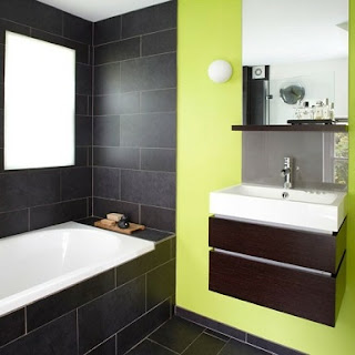 baño color verde y gris