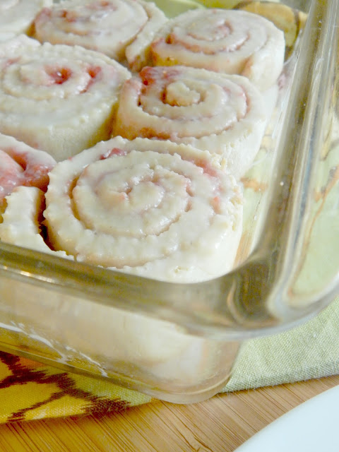 Strawberry Swirl Sweet Rolls...ready in ONE HOUR!  Sweet strawberry jam, filled into between soft dough, then glazed with a sweet almond frosting! (sweetandsavoryfood.com)