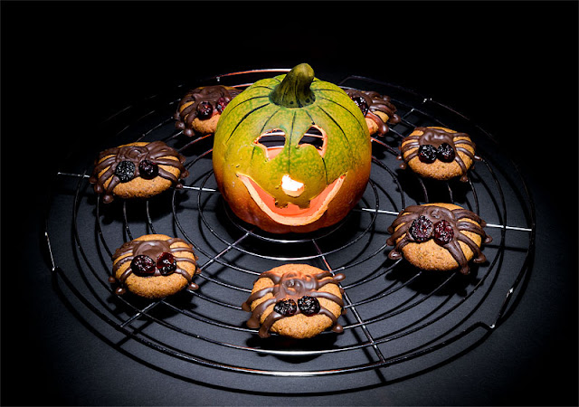 Vegan almonds cookies halloween spiders with pumpkin