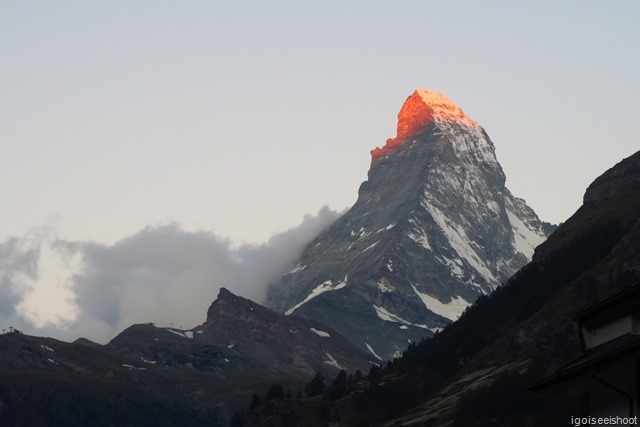 The Matterhorn at sun rise, at the time when the first rays of the sun hit its tip.