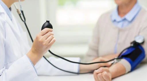 World Hypertension Day, checking blood pressure