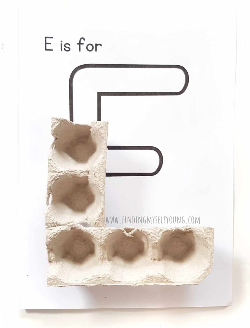 second piece of egg carton added to letter E.