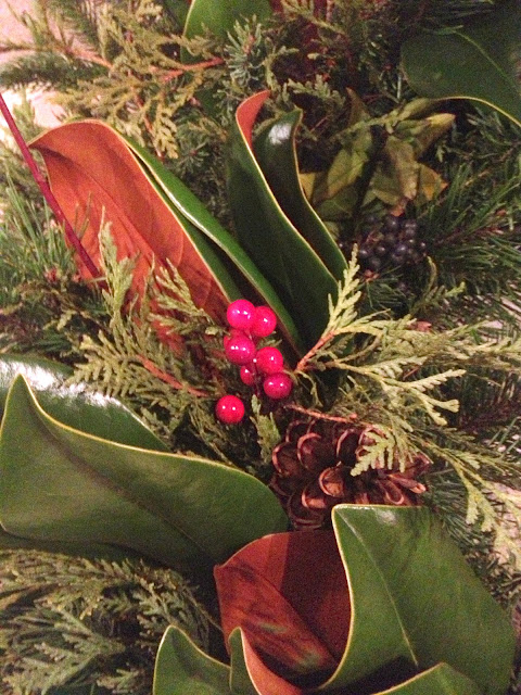 magnolia leaves, berries, pine cone wreath