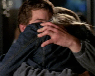 Pacey and Andie hugging tightly