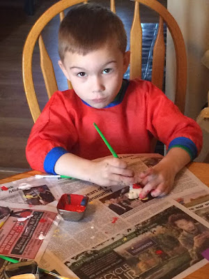 paint, newspaper, paint brush, salt dough ornaments