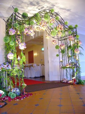 Bridal arches are an easy way to draw attention to the ceremony at an