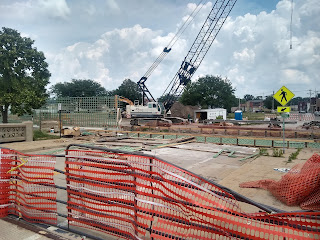 Street with barricades and construction equipment