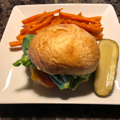 Classic cheeseburger with sweet potato fries