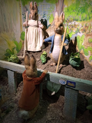 Figure of Peter Rabbit, his mother, and Benjamin Bunny