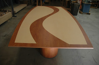 modern custom board room table with contrasting ribbon inlay