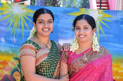 My North Indian aunties in attractive colored sarees.