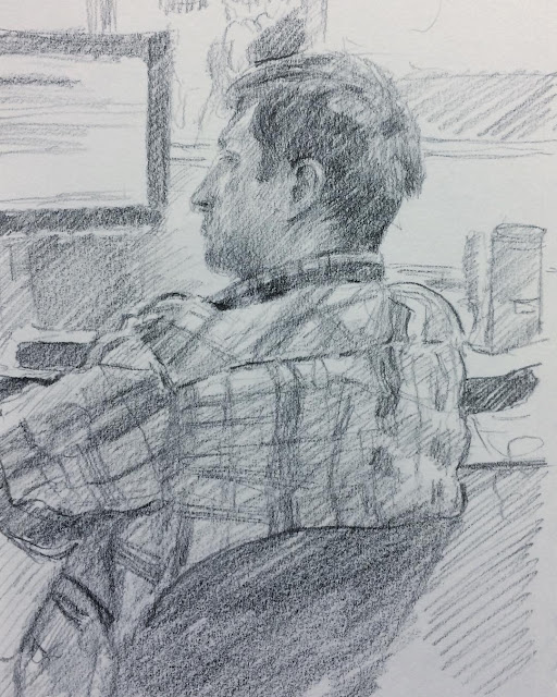 Pencil sketch of Erik working at computer over lunch