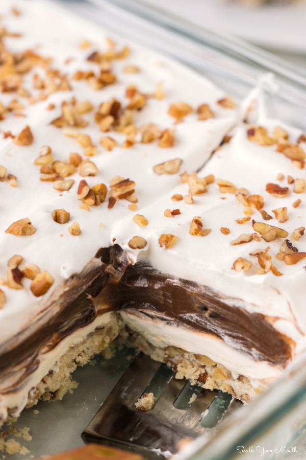 Chocolate Delight! The original layered dessert recipe with chocolate pudding, cream cheese and cool whip on top of a pecan shortbread crust. Also called Better Than Sex Cake, Robert Redford Pie and Chocolate Lush!