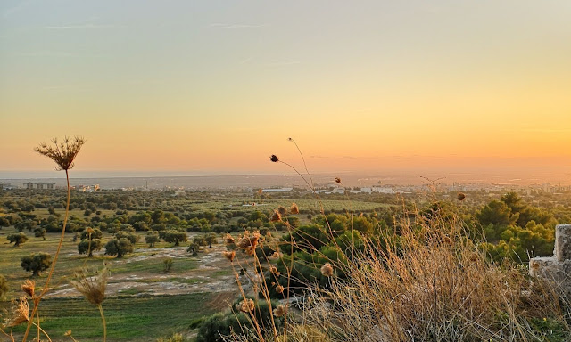 Tramonto arancione sulla piana Massafra