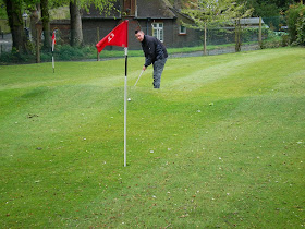 Playing the miniature golf grass putting in Wardown Park, Luton in May 2010