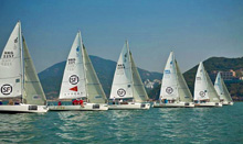 J/80  one-design sailboats- sailing upwind off start in Hong Kong Police Sailing regatta