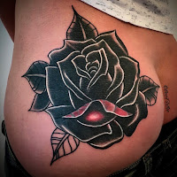 rose cover up tattoo