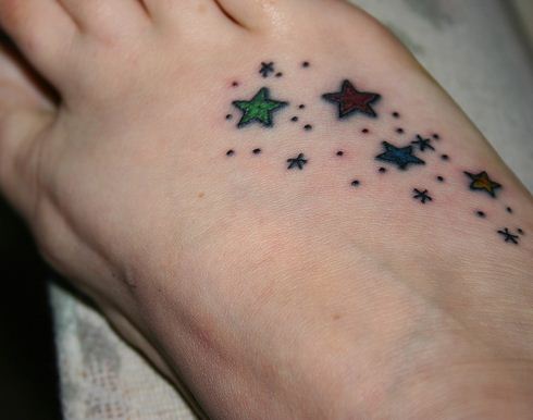 small star tattoo on foot