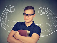 Muscle nerd geek holding books