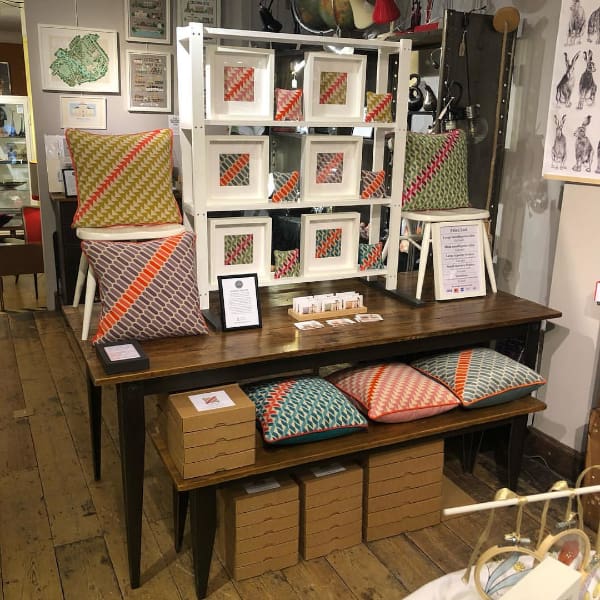 Craft Market Stall displaying needlepoint cushion kits by Marina's Home