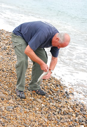 William sea fishing for the first time off Seaton beach. 27/07/2010