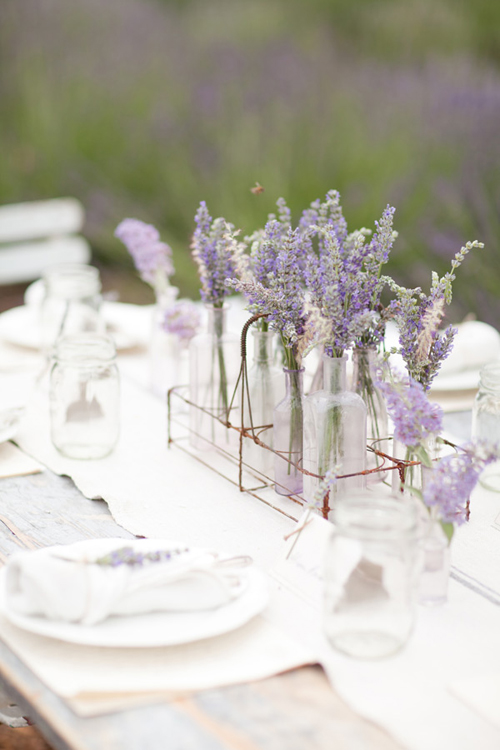 We used a vintage french bar glass holder for the table center 