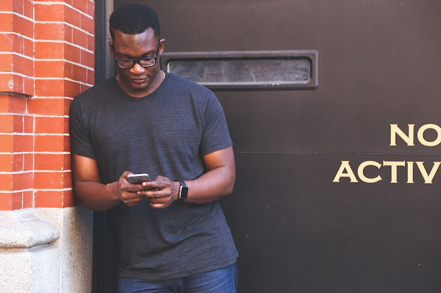 man on phone banking app