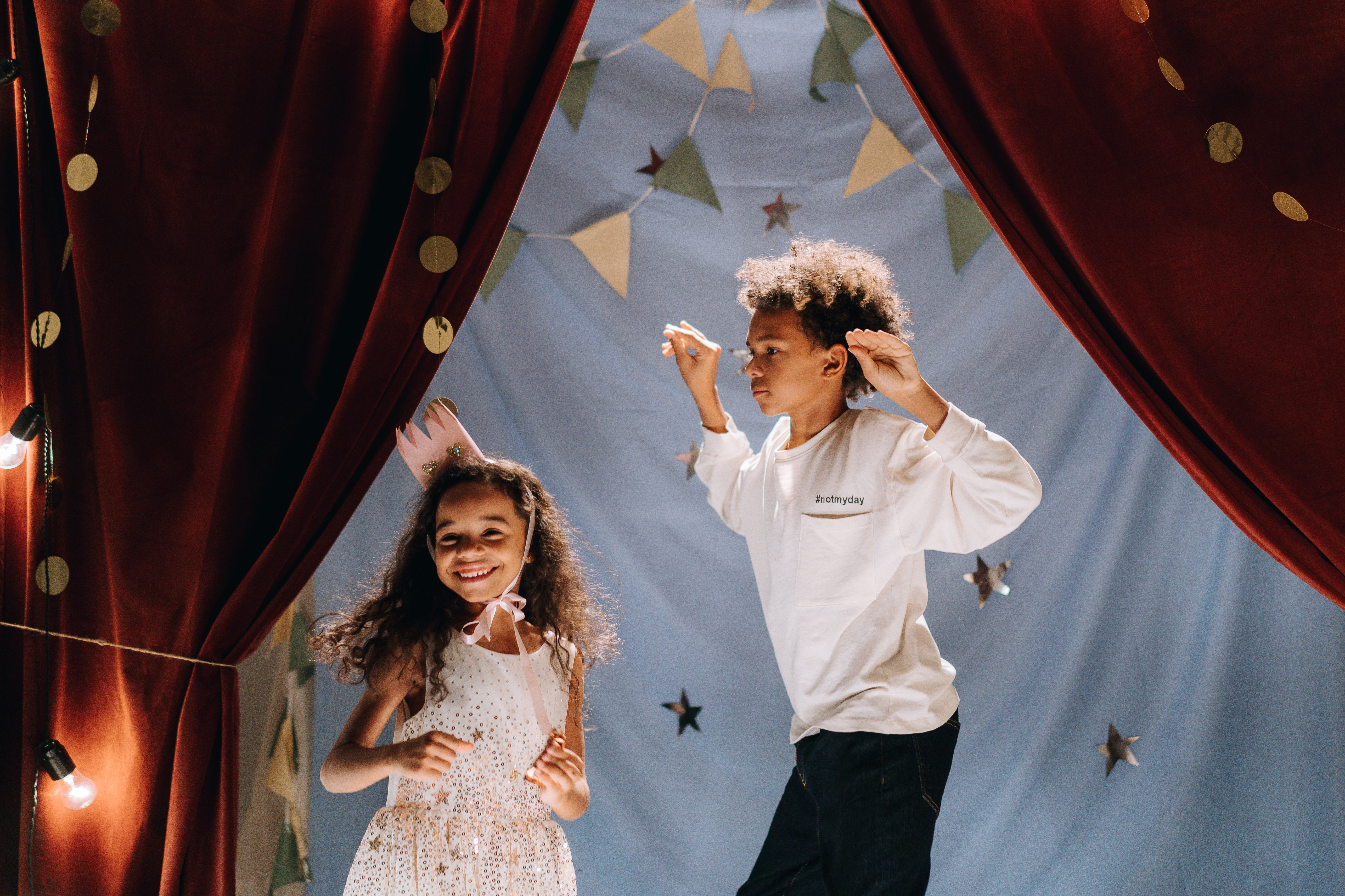 Two children acting in their own play. Picture by cottonbro studio for Pexels