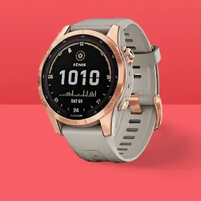Front view of Garmin Fenix 7S Solar smartwatch with a red back