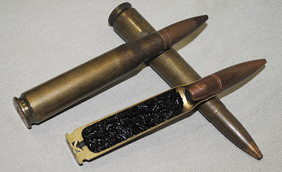 dummy cross section of 50 cal BMG with 2 live rounds