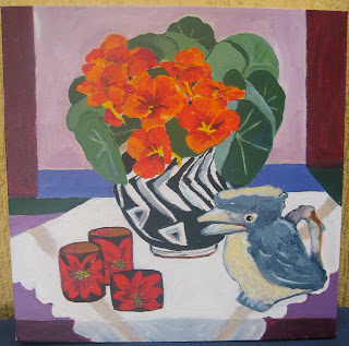 Painting of nasturtiums, pokerwork napkin rings and kookaburra jug.