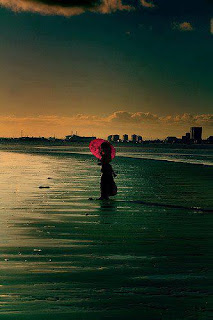 Lonely Girl Alone in the Beach