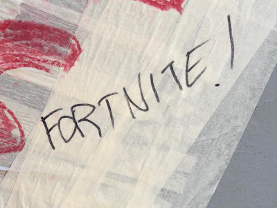 Fortnite! written in corner of sign