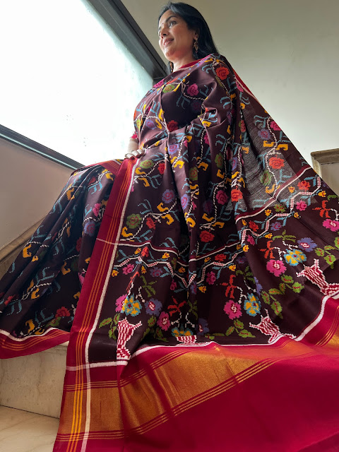 A Symphony of Elegance: Coffee Brown Double Ikat Patan Patola Saree with Multicolored Roses