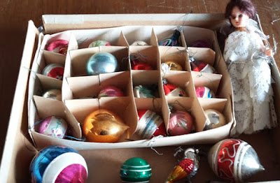 A box of 1950s Christmas tree ornaments.