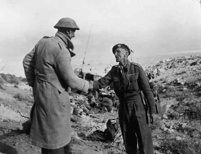 Celebratory handshake after relief of Tobruk garrison in North Africa, 27 November 1941 worldwartwo.filminspector.com