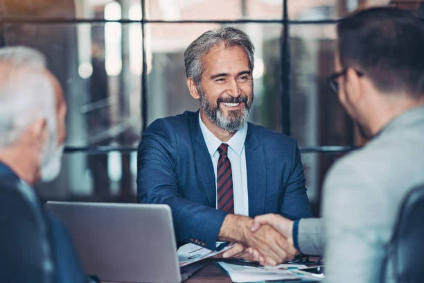 Handshake between two colleague